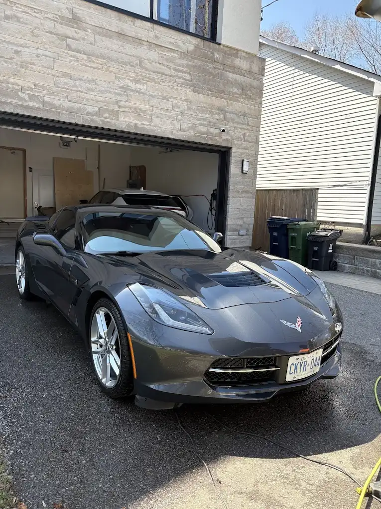 Gray Corvette detailed by Fly Auto Spa in an Ottawa driveway